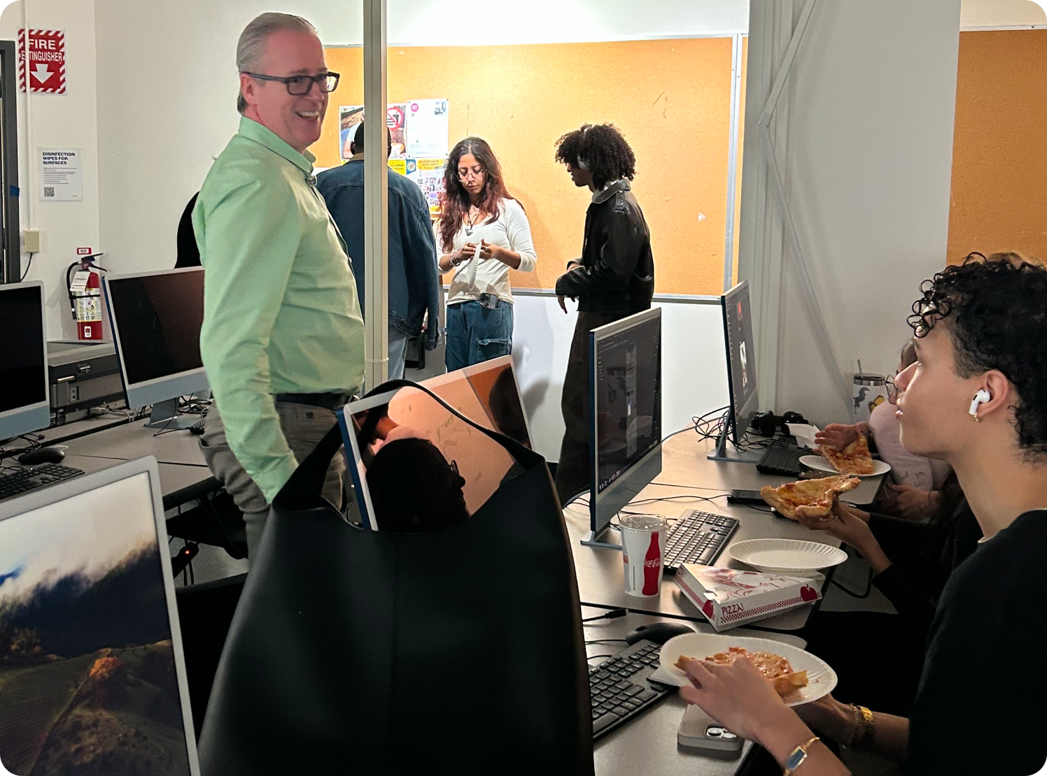 Joey speaking with his students